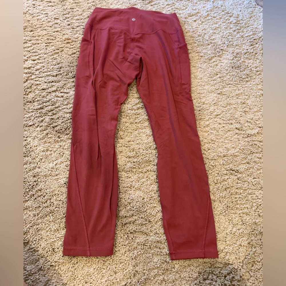 Terracotta Lululemon leggings with pockets